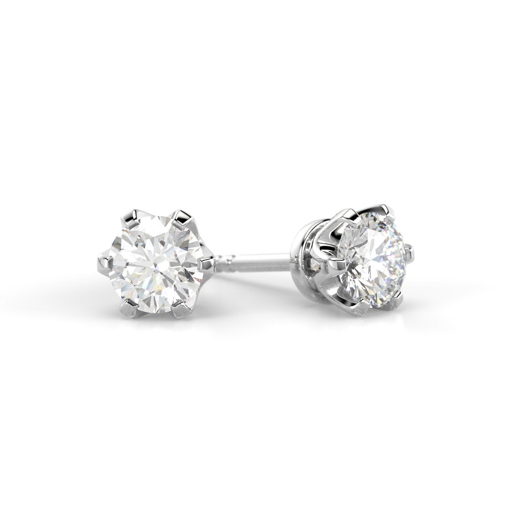 FESTIVE Classic 2 x 0,30 ct Timanttikorvakorut 129-060K