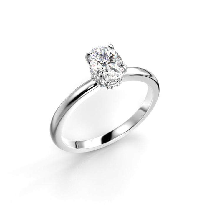 Festive Heidi Hidden Halo Oval 0,60 ct timanttisormus valkokulta, viistokuva