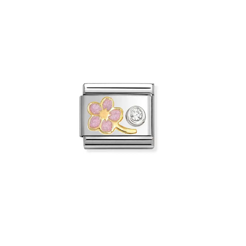 Nomination Classic gold sarjan pala 630202/08 pinkillä lemmikillä ja kirkkaalla zirkonia-korukivellä. Koruosa on laadukasta 18 karaatin keltakultaa ja 925 sterling-hopeaa.